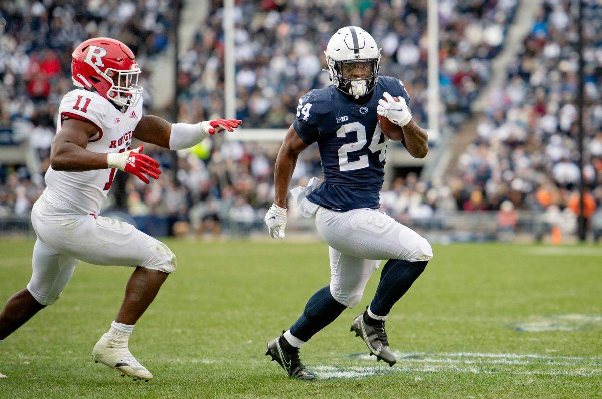 Rutgers linebacker Drew Singleton canÕt stop Penn State running back Keyvone Lee as he cuts down the field to score a touchdown in the fourth quarter of the game on Saturday, Nov. 20, 2021.