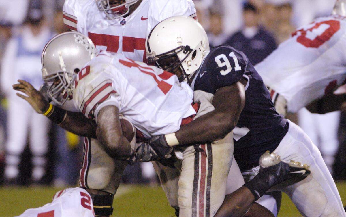 Penn State’s Tamba Hali (91) sacks Ohio State quarterback Troy Smith (10) during the 4th quarter on Saturday, Oct. 8, 2005.