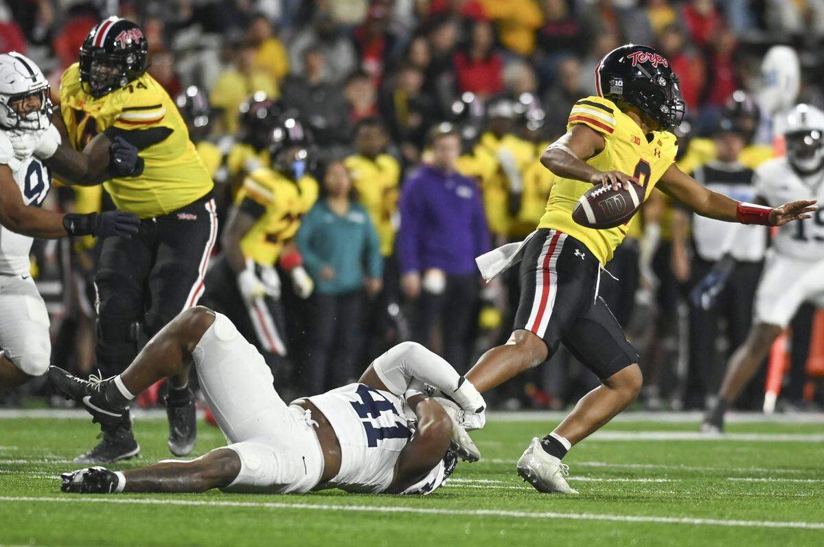 Nov 4, 2023; College Park, Maryland, USA; Penn State Nittany Lions linebacker Kobe King (41) sacks  Maryland Terrapins quarterback Taulia Tagovailoa (3) during the second half  at SECU Stadium. Mandatory Credit: Tommy Gilligan-USA TODAY Sports