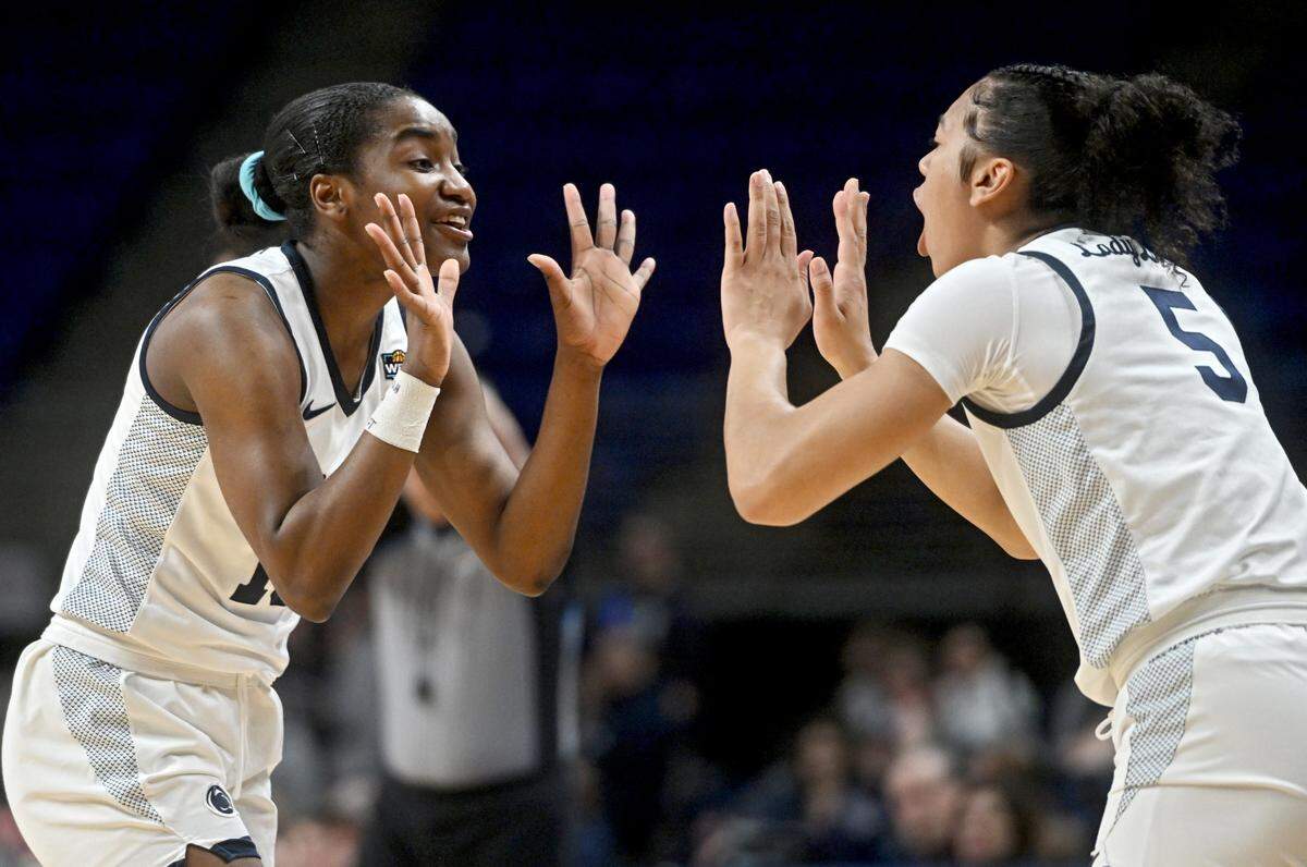 Penn State’s Chanaya Pinto and Leilani Kapinus celebrate during the game against Belmont on Monday, March 25, 2024 at the Bryce Jordan Center. Penn State won, 74-66 to move on in the WBIT.
