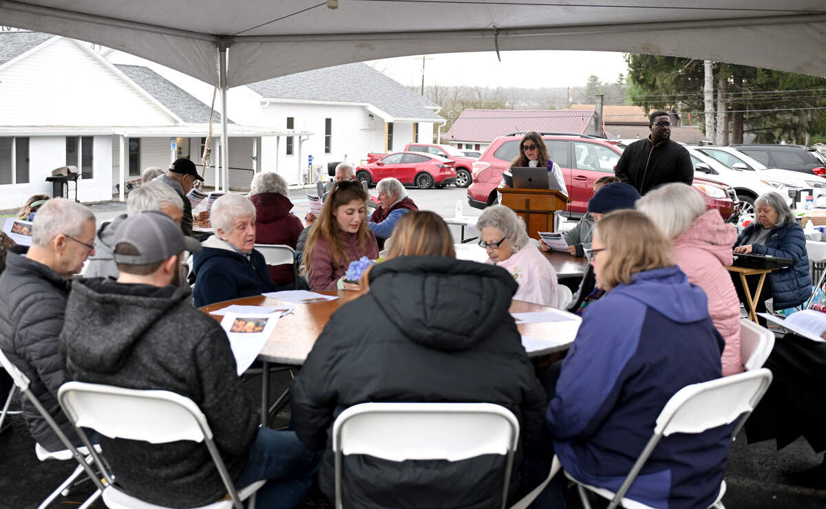 Congregants of Woodycrest United Methodist Church gathered outside for a steeple blessing on Thursday, April 2, 2026. The church is still being rebuilt after being damaged in a fire in 2024, but the original steeple was saved.