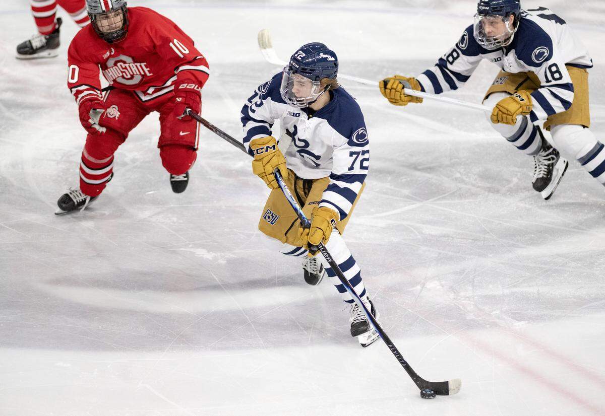 Penn State's Gavin McKenna skates down the ice with the puck ahead of an Ohio State defender during the on Friday, Feb. 20, 2026. 
