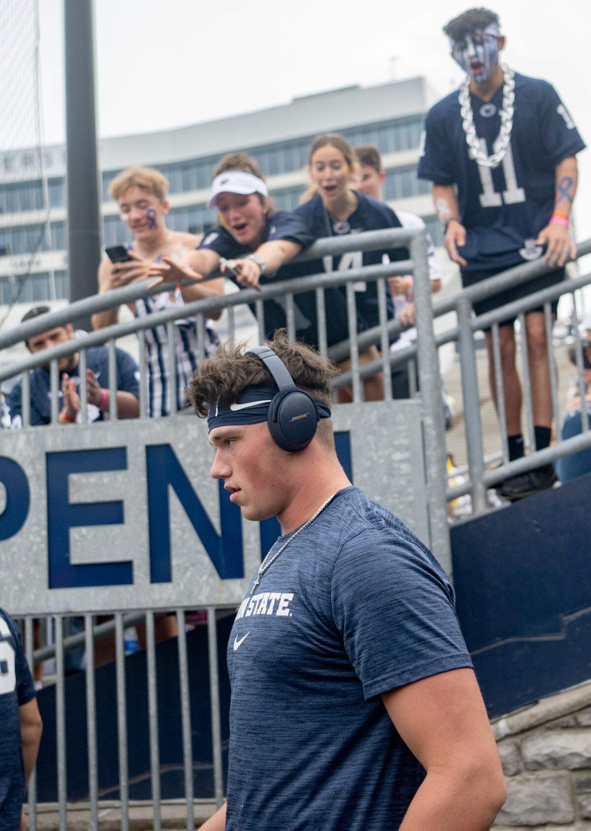 Penn State fans cheer and reach for quarterback Drew Allar as he walks out to warm up for the game against Delaware on Saturday, Sept. 9, 2023.
