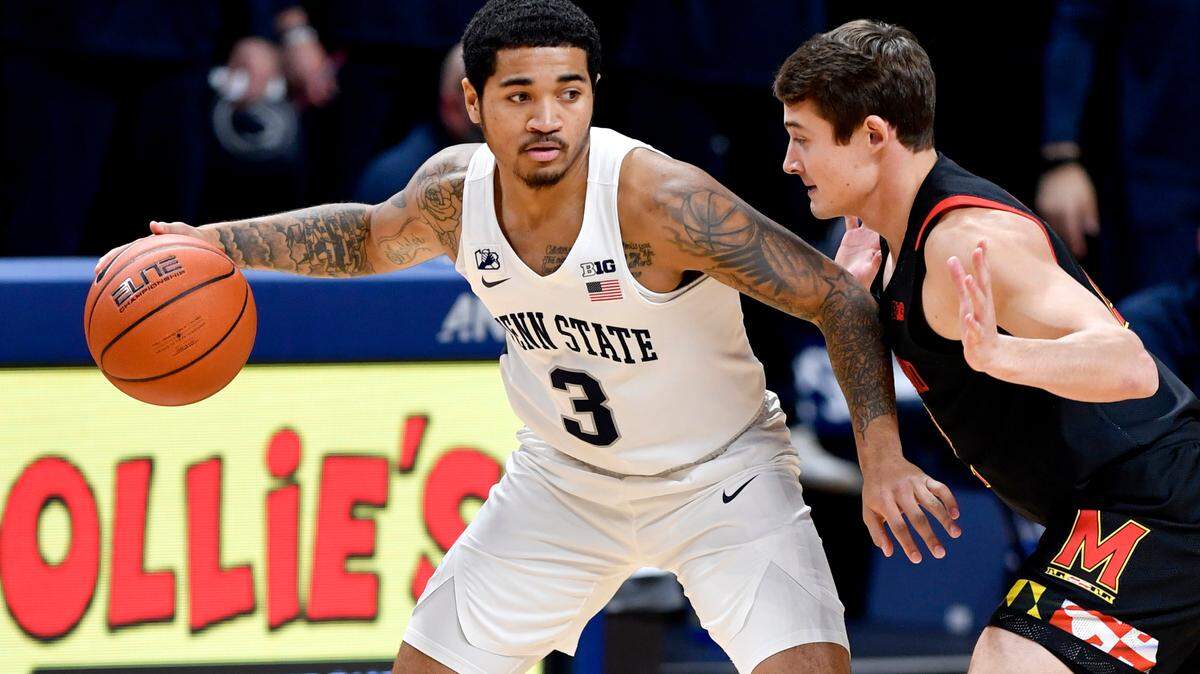 Penn State’s Sam Sessoms dribbles around a Maryland defender during the game on Friday, Feb. 5, 2021 at the Bryce Jordan Center in State College, Pa.