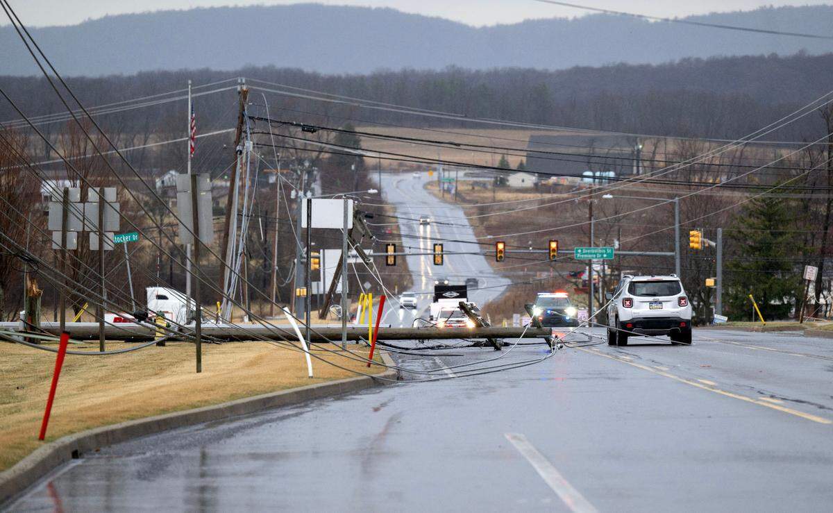 A pole and wires down at the intersection of Shiloh Road and Stocker Drive after a severe storm on Sunday, March 16, 2025.