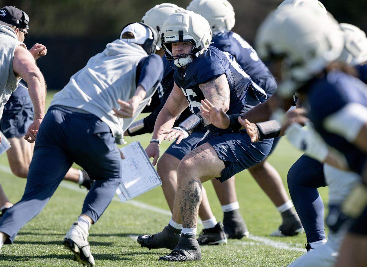 Penn State offensive lineman Will Tompkins runs a play during practice on Thursday, April 9, 2026.  