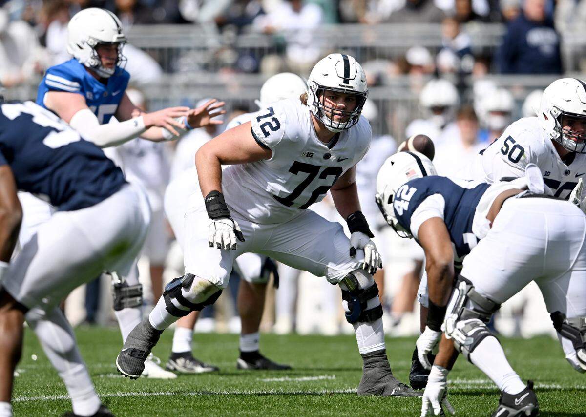 Penn State offensive lineman Nolan Rucci blocks for a play during the Blue-White game on Saturday, April 13, 2024.