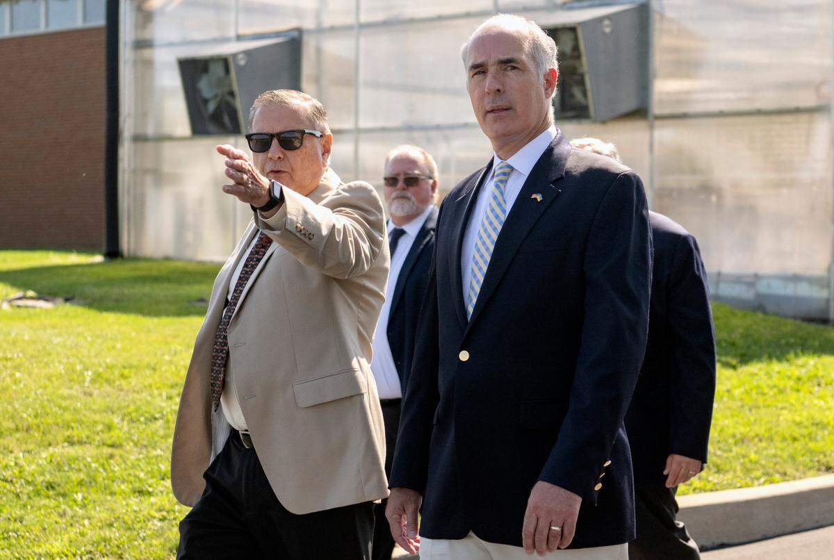 Central Pennsylvania Institute of Science and Technology president Richard Makin points out to Sen. Bob Casey on Thursday where the new health care training facility will be built.