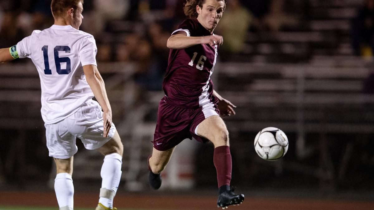 State College’s Ben Vollmer cuts past several Norwin defenders to score a goal in the first half of game on Tuesday, Nov. 6, 2018 at Bald Eagle Area. State college won the first round of the PIAA 4A soccer championships.