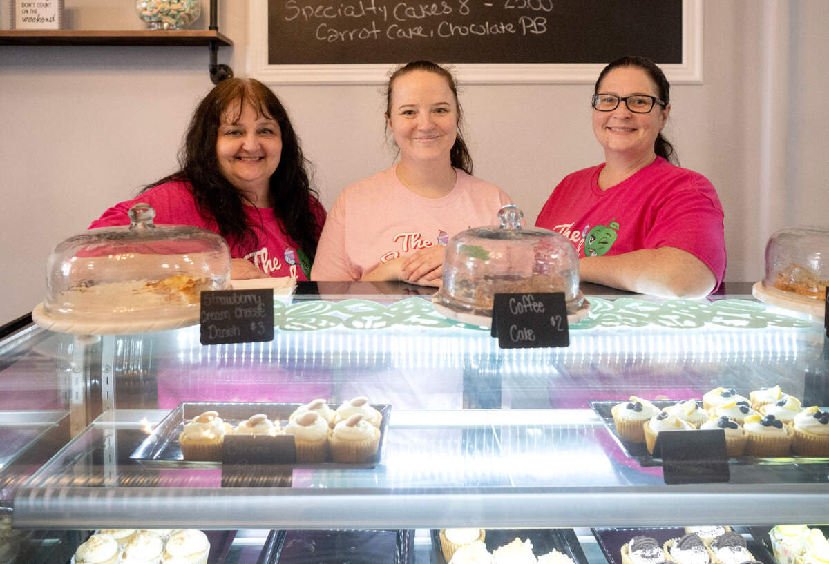 Careena Timblin, Mae Kopchik and Tawyna Reitz pose inside the new Sweet Suite at 119 N. Front St. in Philipsburg on Wednesday. Timblin and Reitz are the creators of Sissy’s Sassy Apples, and Kopchick bakes the treats of Mae’s Makin’s.