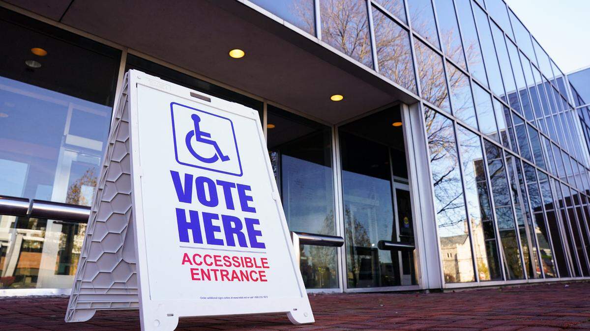 A voting sign sits Nov. 8, 2022, outside Allentown Public Library in Allentown, Lehigh County, Pennsylvania. (Matt Smith / For Spotlight PA)