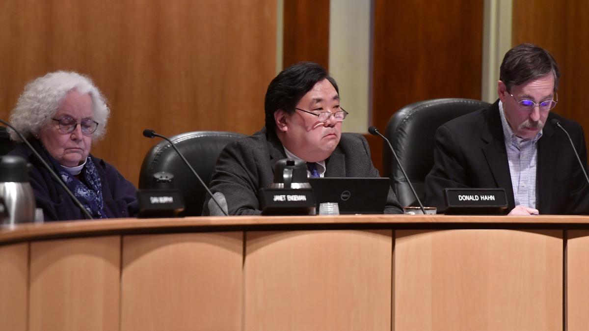 Mayor Don Hahn listens to the public comment portion of a State College Borough Council meeting in April.