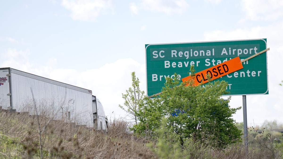 The closed sign on the sign for the Penn State exit from Route 322 westbound on Wednesday, April 22, 2026. 