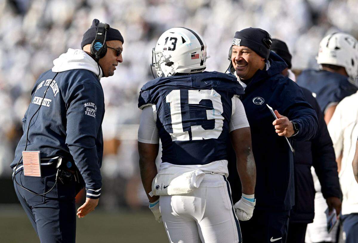 Penn State head coach James Franklin and running backs coach Ja’Juan Snider congratulate Kaytron Allen after his touchdown during the game against SMU on Saturday, Dec. 21, 2024 at Beaver Stadium.
