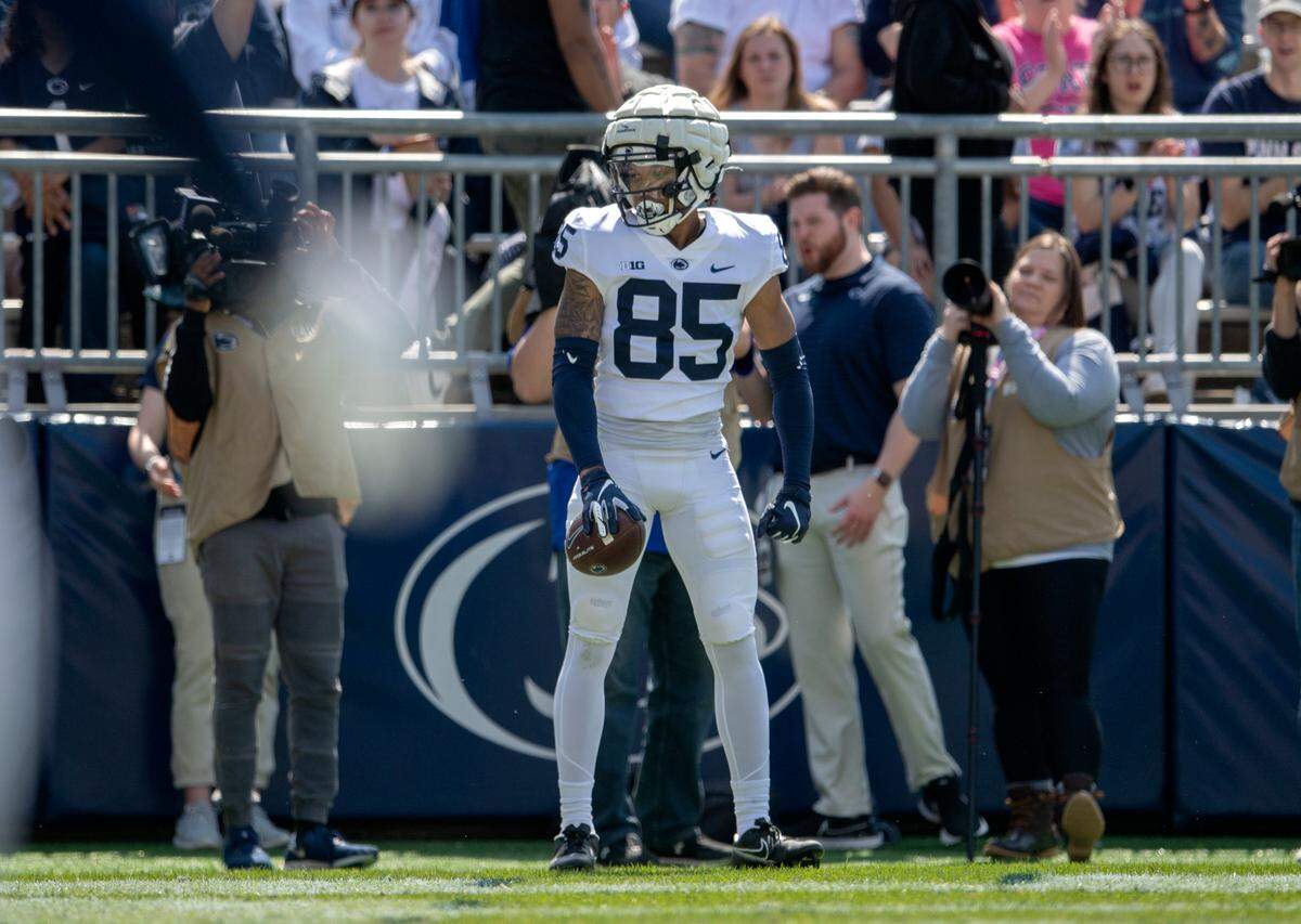 Penn State wide receiver Harrison Wallace III holds the ball after a play during the Blue-White game on Saturday, April 23, 2022.