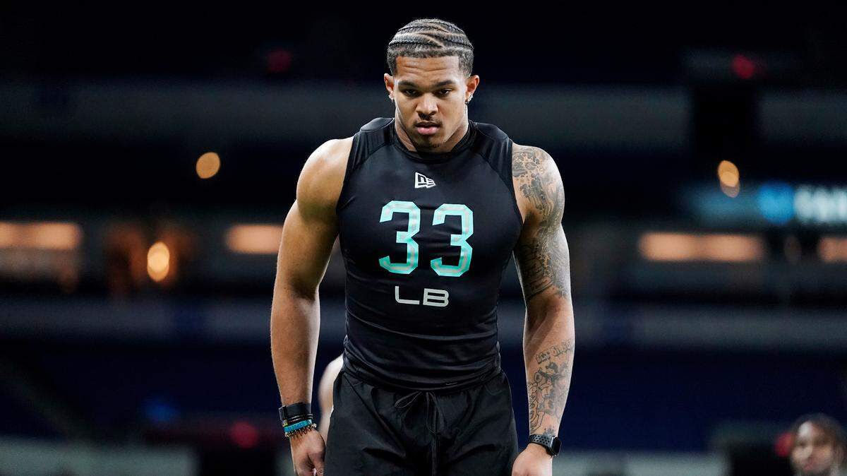 Penn State linebacker Brandon Smith (33) participates in the broad jump at the NFL football scouting combine in Indianapolis, Saturday.