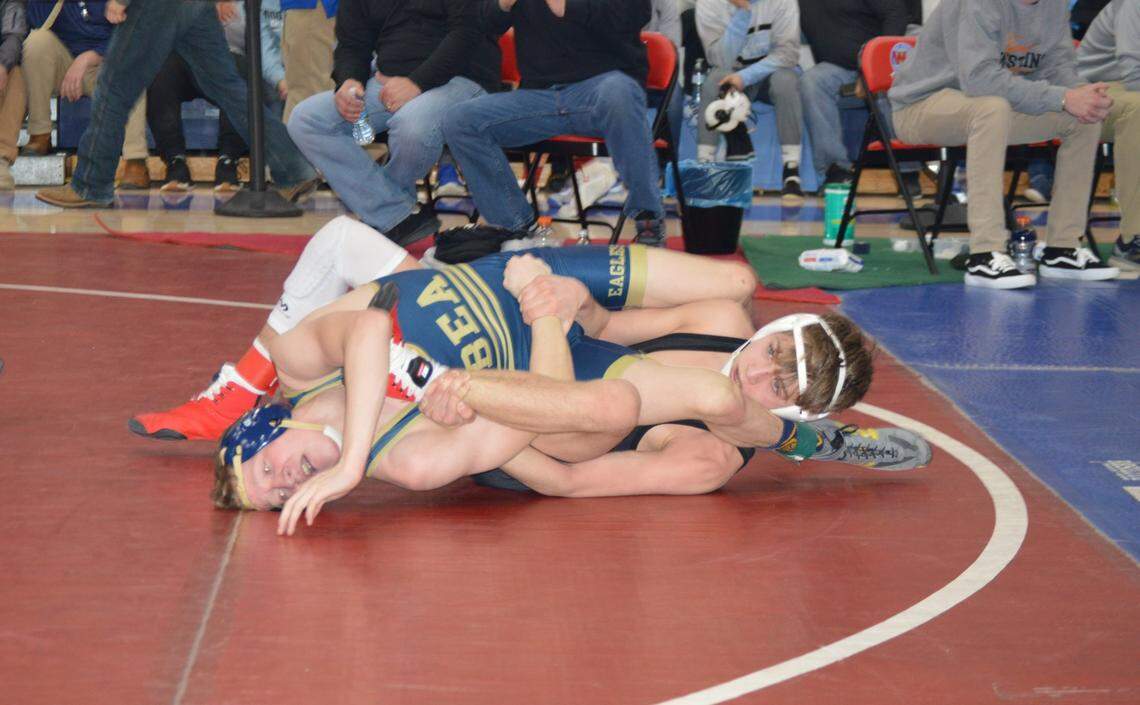 Bald Eagle Area’s Lucas Fye scrambles with Brockway’s Weston Pisarchick in their 113-pound third-place match during the Ultimate Warrior Tournament on Saturday at West Branch High School in Allport. Pisrachick topped Fye, 12-7.