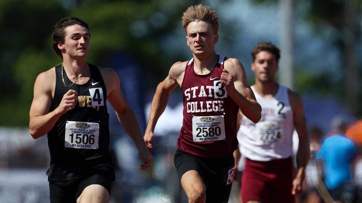 State College’s Jesse Myers, center, competes in the Class 3A 200 meter dash preliminaries during the PIAA Track and Field Championships held Friday at Seth Grove Stadium on the Shippensburg University campus. He won the gold medal on Saturday.