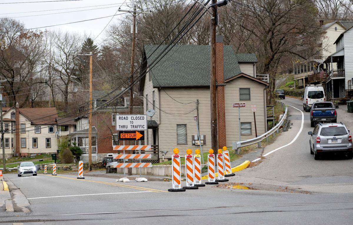Traffic must use a detour on Stoney Batter Road due to South Water Street being one lane after a wall partially collapsed into Spring Creek.