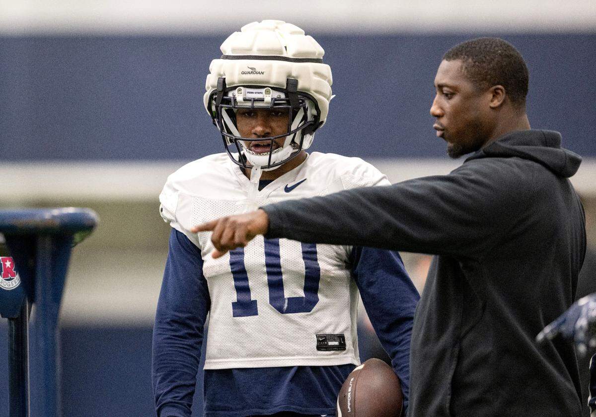 Penn State running back Nick Singleton listens to instructions for a drill during practice on Wednesday, Dec. 18, 2024.