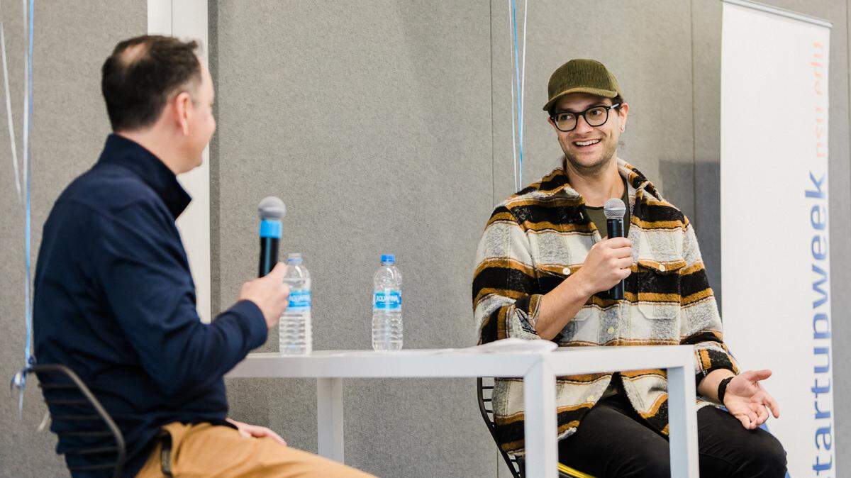 Invent Penn State’s James Delattre, left, speaks with Tuft & Needle founder JT Marino during Penn State Startup Week earlier this month.