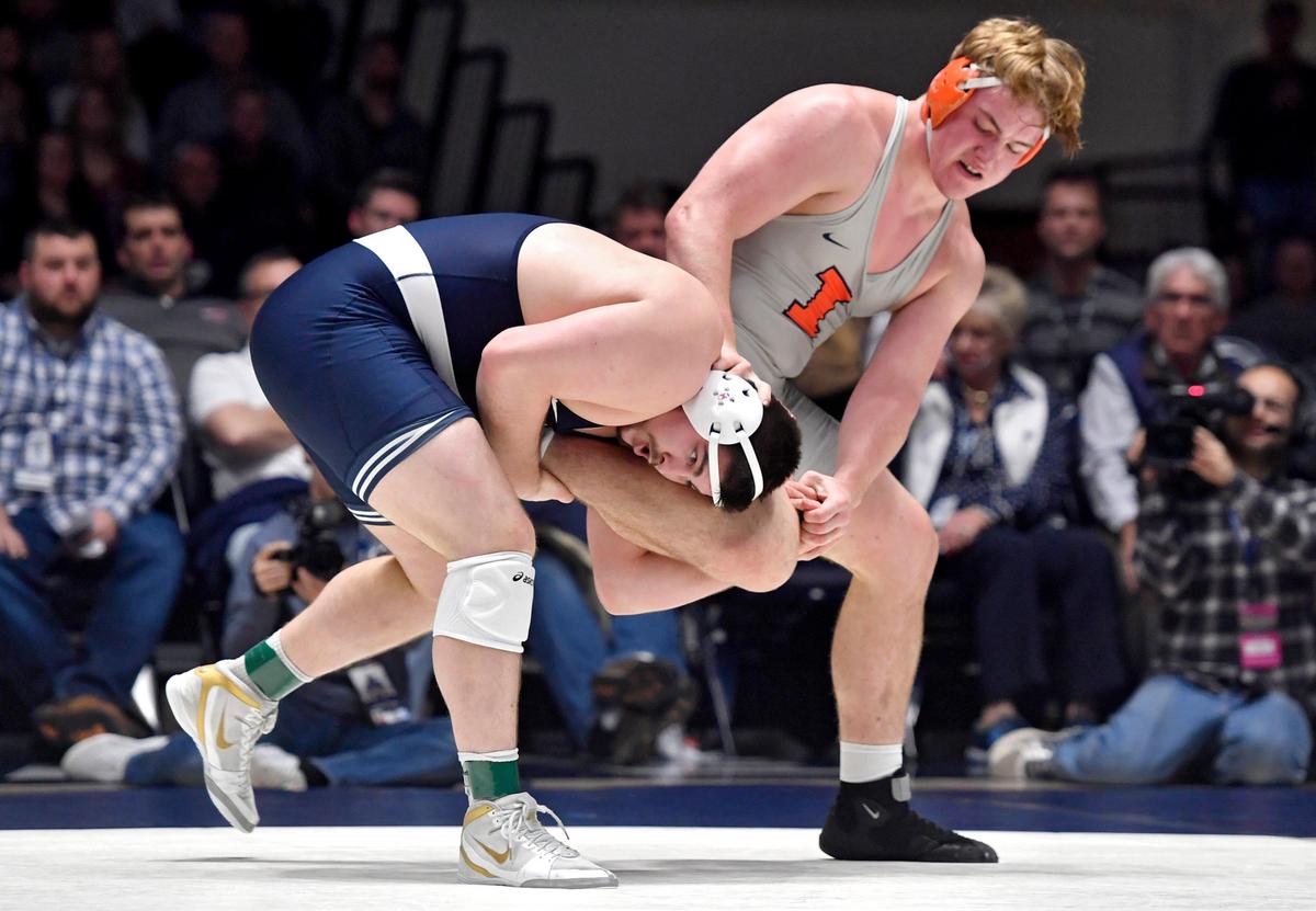 Penn State’s Seth Nevills tries to take down Illinois’ Luke Huffman in the 285 lb bout during the match on Friday, Jan. 10, 2020 in Rec Hall. Nevills won by decision, 6-3.
