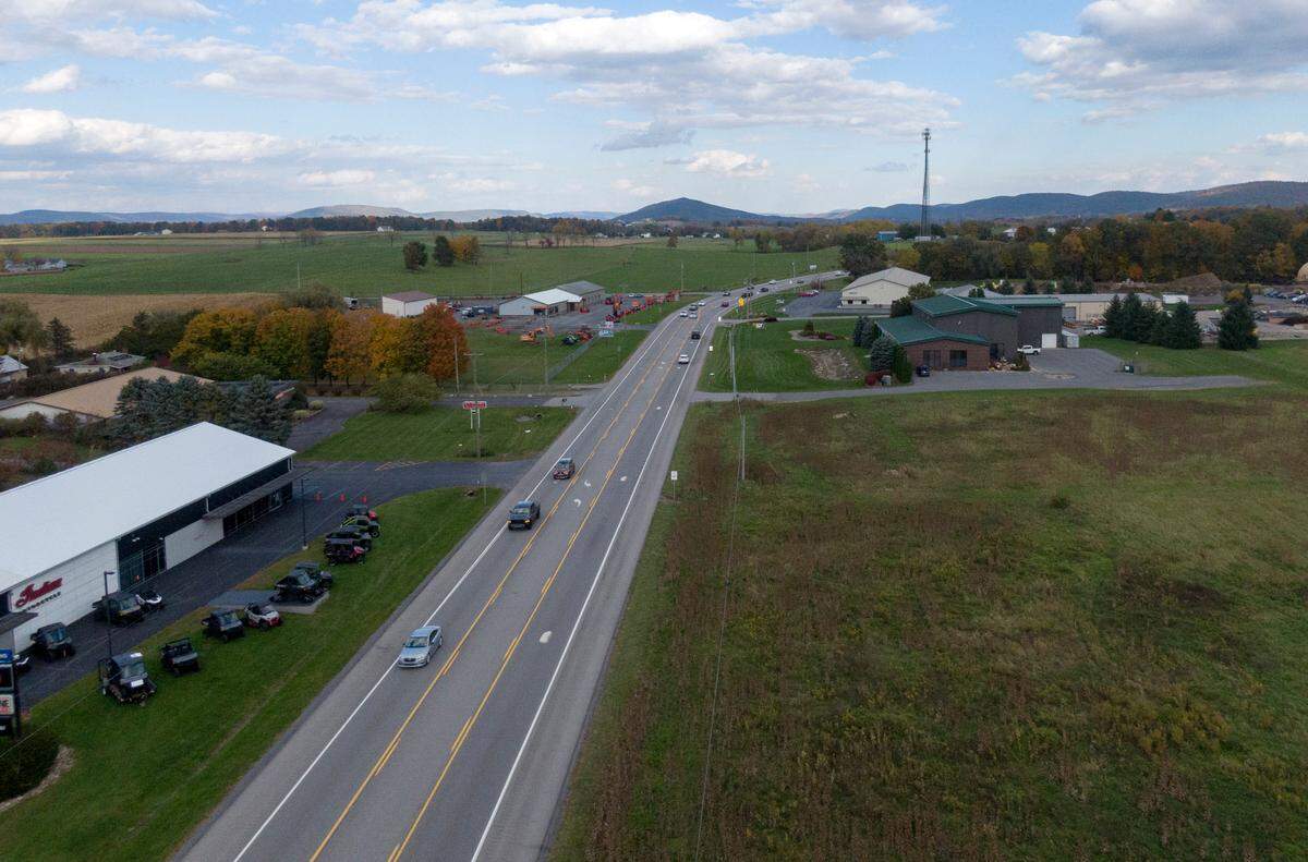 Traffic travels on Route 322 in the area of several businesses on Friday, Oct. 14, 2022.