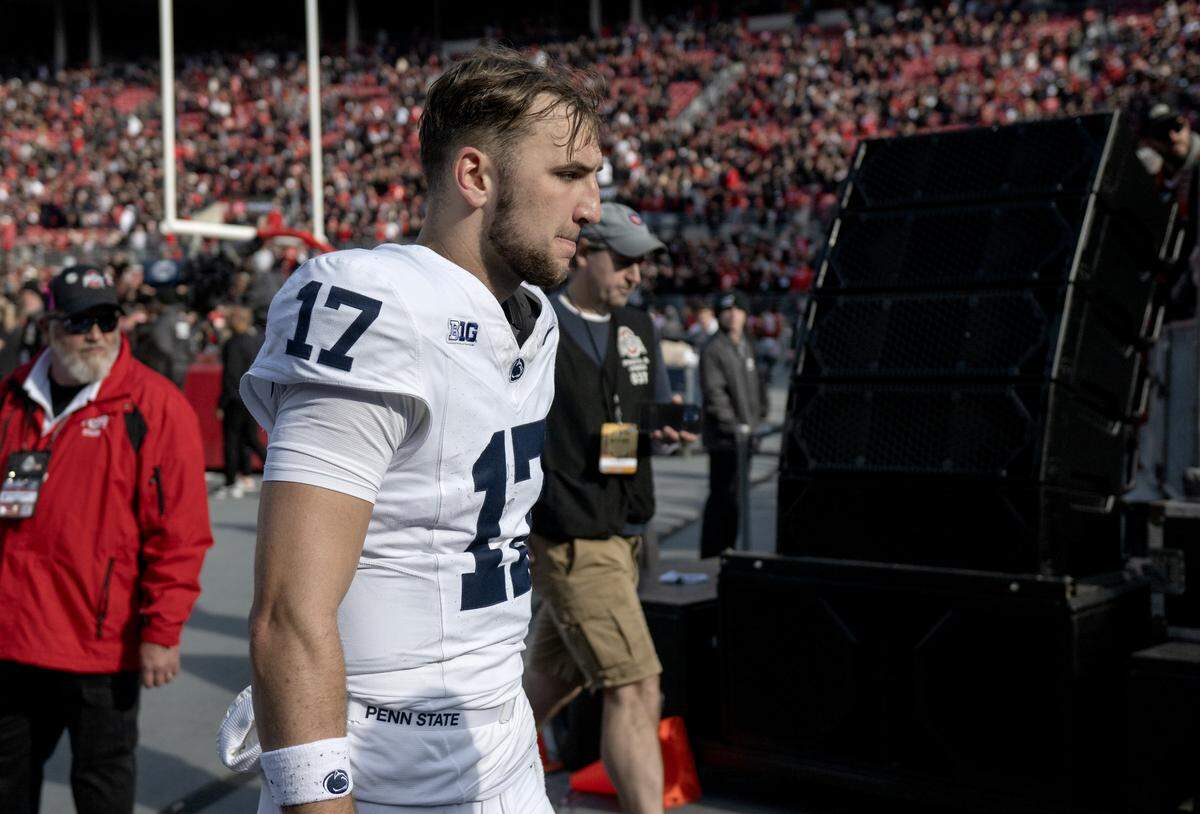 Penn State quarterback Ethan Grunkemeyer walks off the field in disappointment after the loss to Ohio State on Saturday, Nov. 1, 2025. 