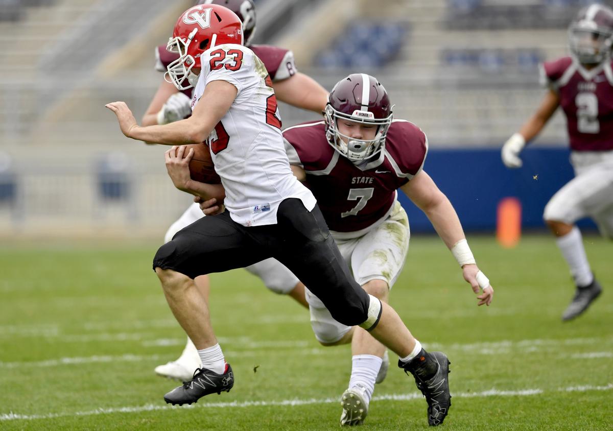 State College’s Sammy Knipe reaches for Cumberland Valley’s Maximos Dell’anno during the Beaver Stadium Classic on Saturday, Oct. 26, 2019.