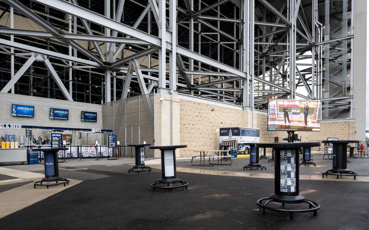 The open-air Gate F lounge area at Beaver Stadium features local food trucks, tables and a large screen TV before the game against Bowling Green on Saturday, Sept. 7, 2024.