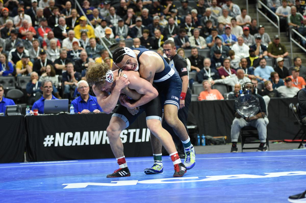 Penn State’s Aaron Brooks controls North Carolina State’s Trent Hidlay in their 184-pound semifinals bout of the NCAA Championships on Friday, March 18, 2022 at Little Caesars Arena in Detroit. Brooks edged Hidlay, 6-4, in sudden victory.