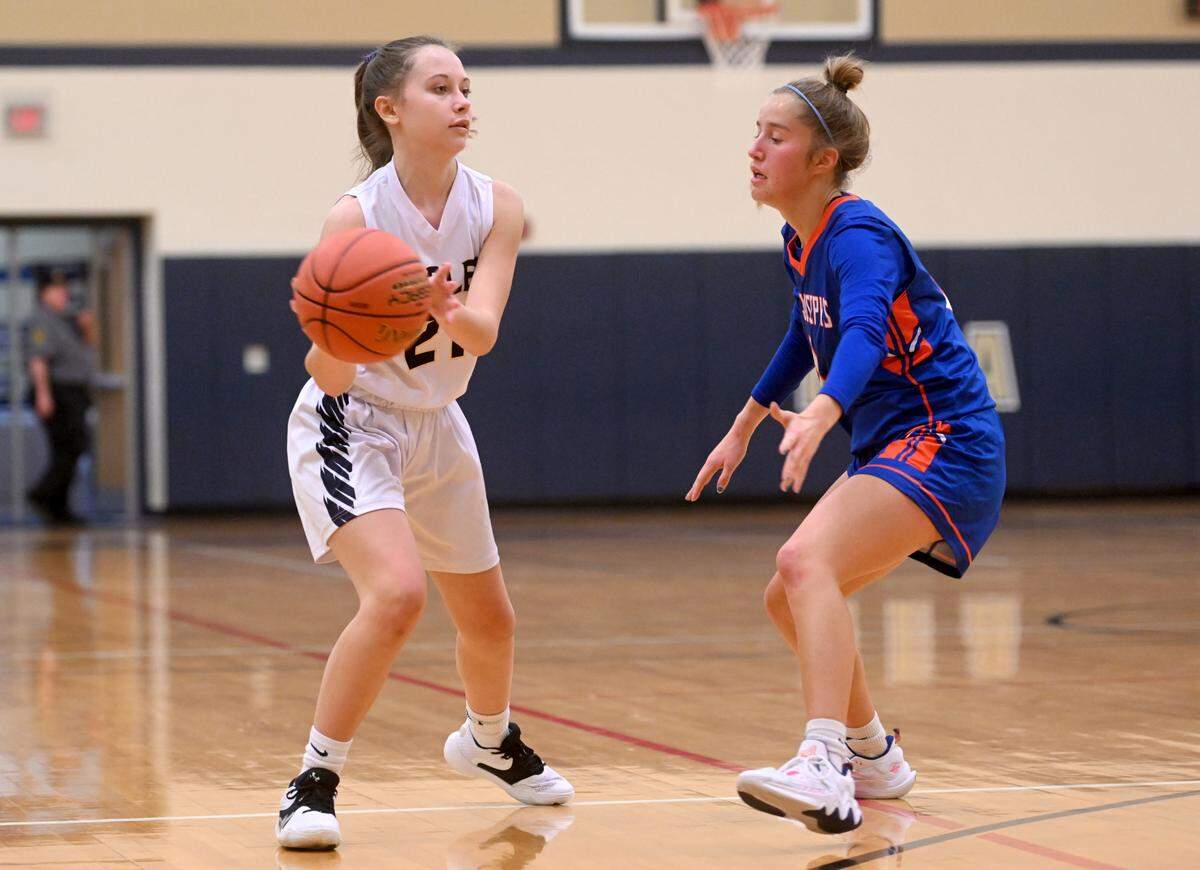 Bald Eagle Area’s Emma Hoover looks to pass around a Saint Joseph’s defender during the game on Tuesday, Dec. 6, 2022.