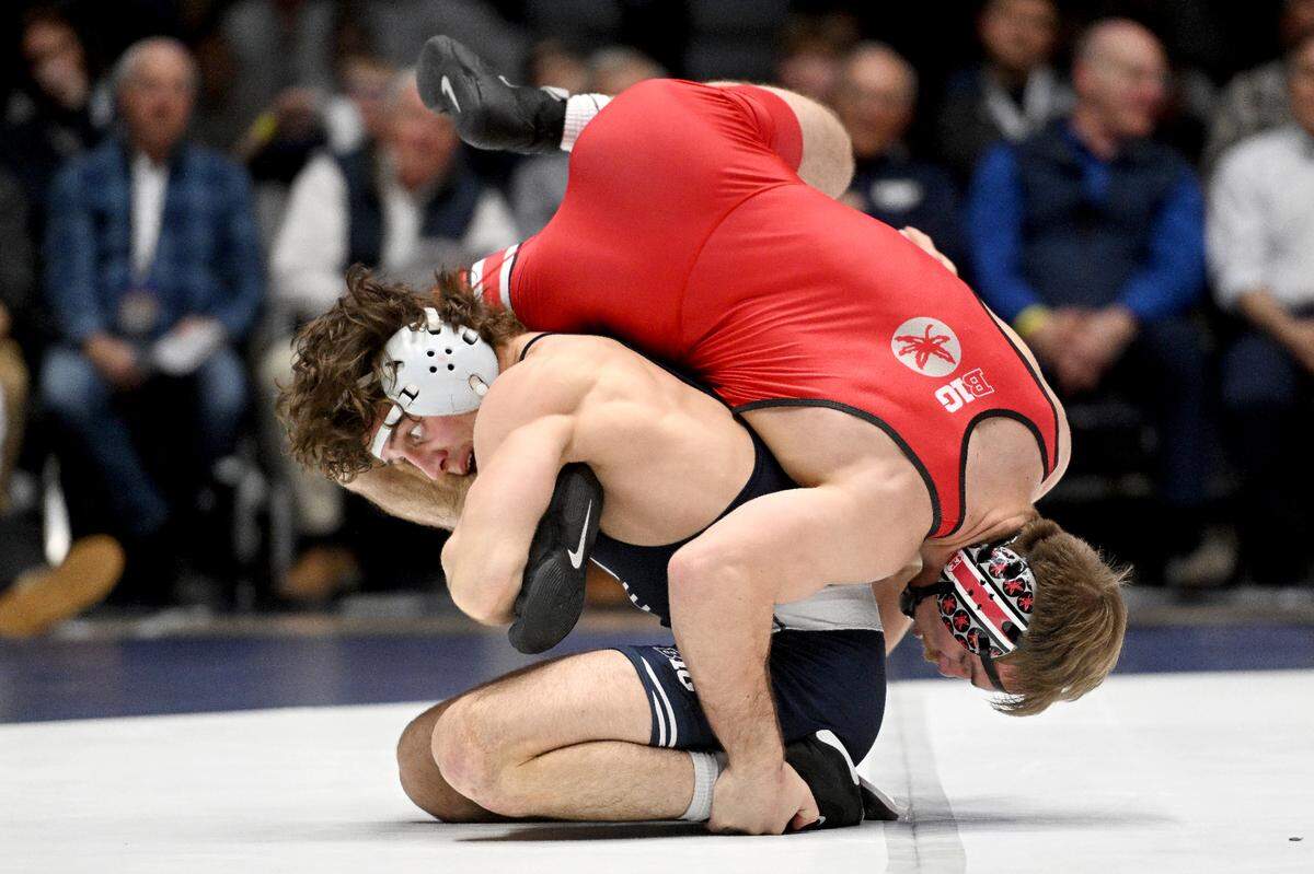 Penn State’s Levi Haines wrestles Isaac Wilcox in the 157 lb bout during the match on Friday, Feb. 2, 2024 in Rec Hall.