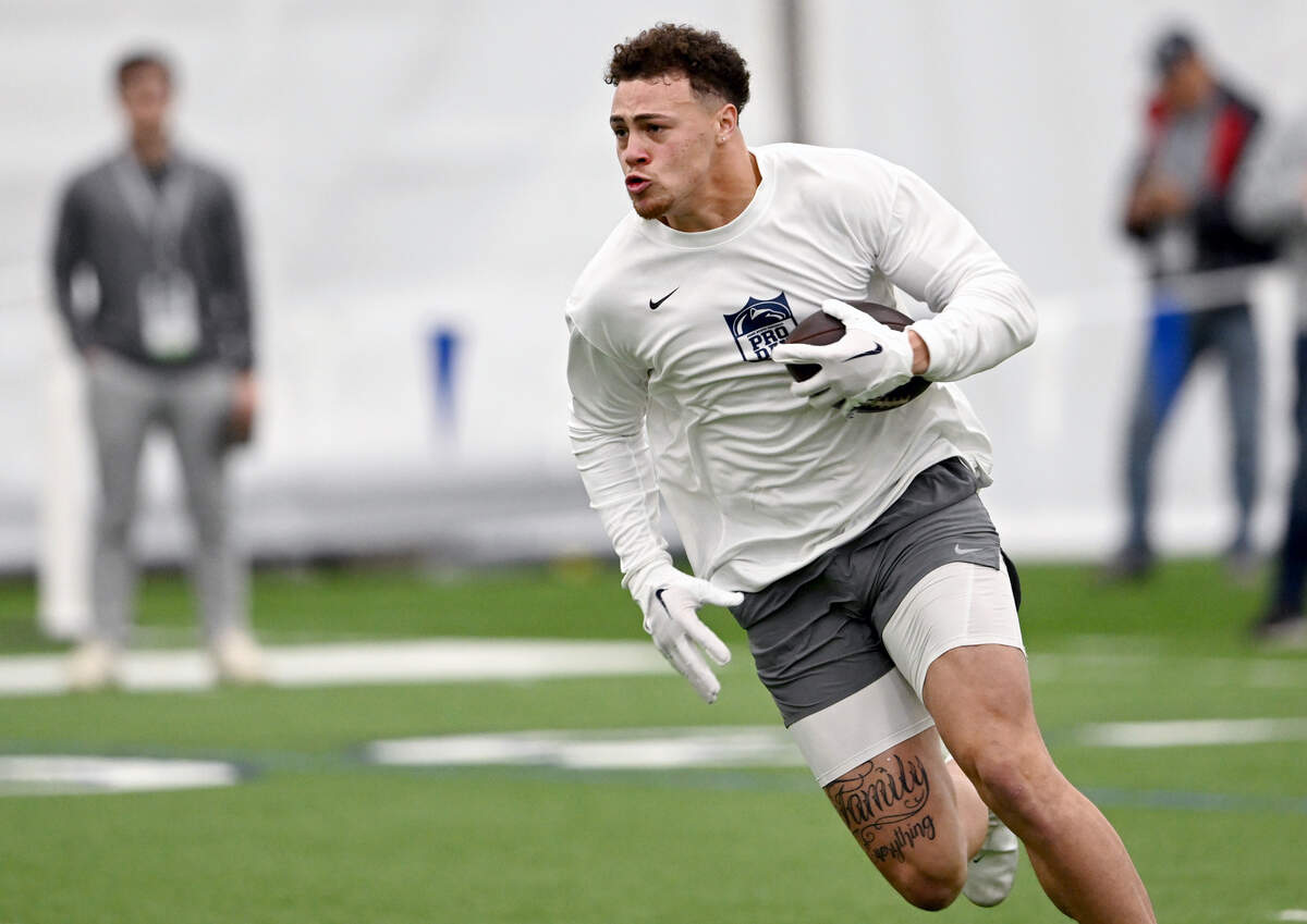 Tight end Theo Johnson makes a catch and runs with the ball during Penn State’s Pro Day on Friday, March 15, 2024 in Holuba Hall.