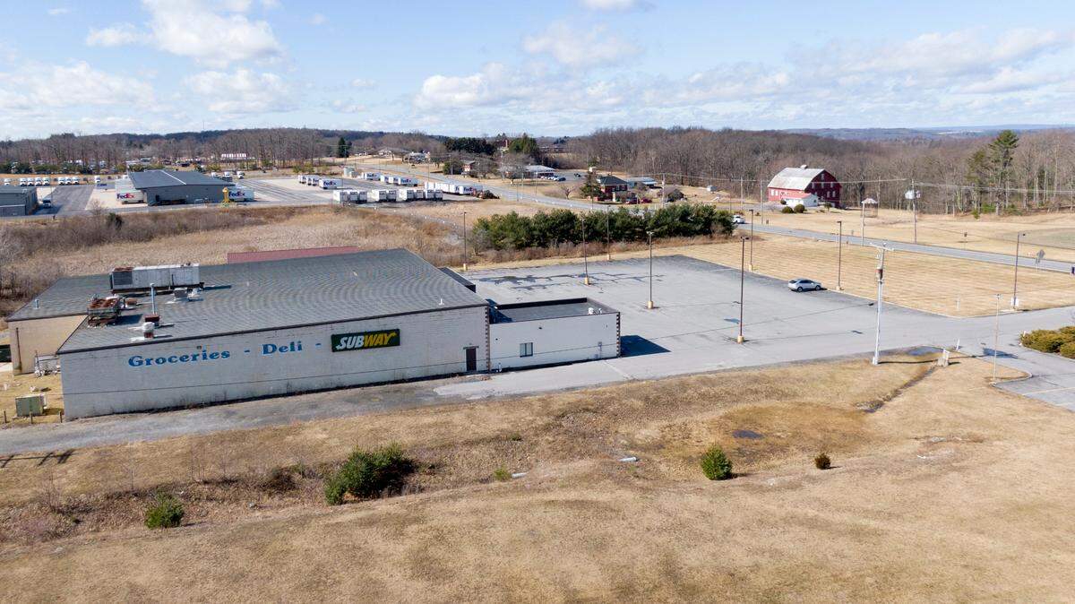 The building that formerly housed Hall’s Market, True Value, Subway and Jersey Shore State Bank in Snow Shoe sits empty on Thursday, Feb. 23, 2023.