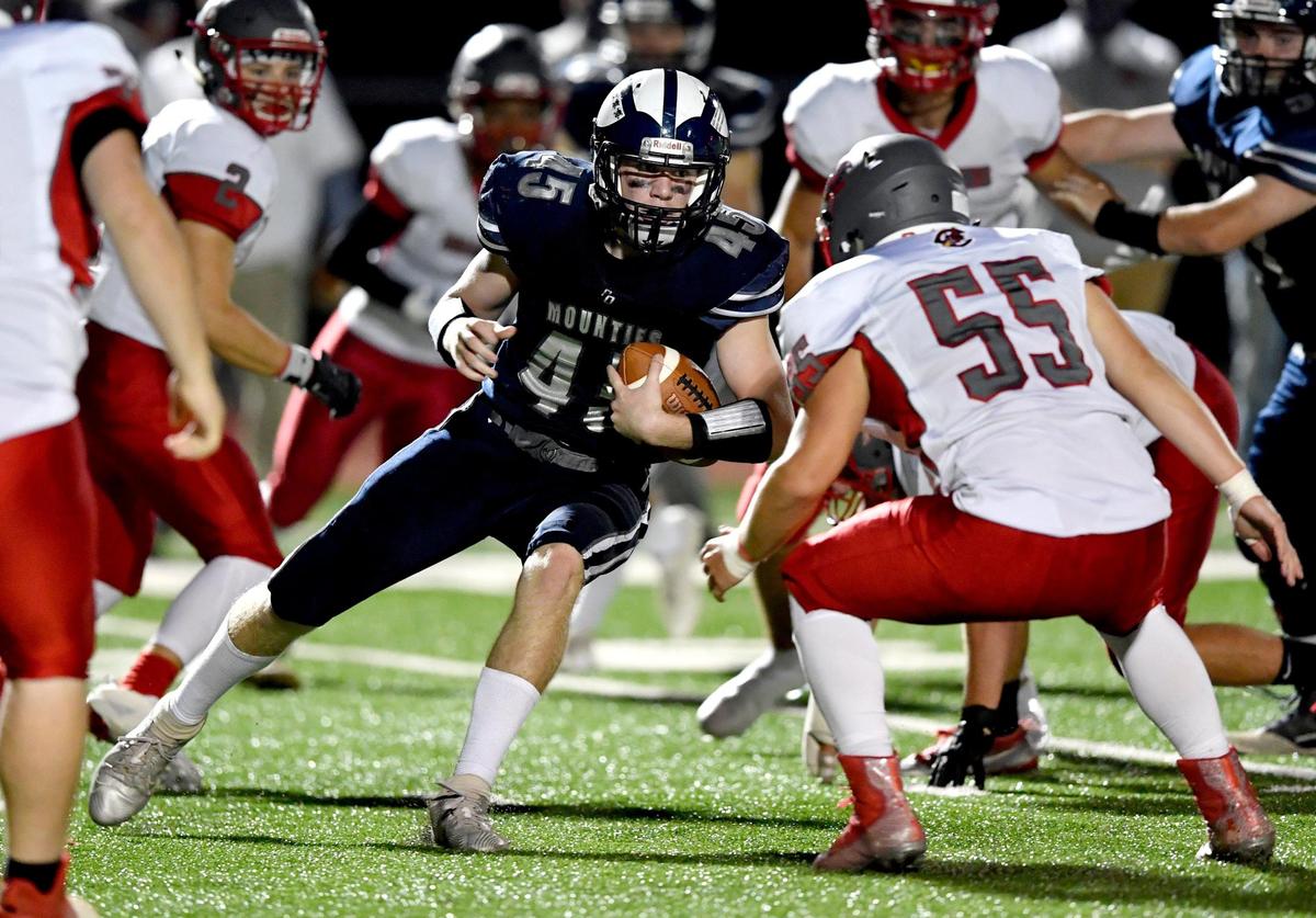 Philipsburg-Osceola’s Aaron Depto cuts through Central defenders during the game on Friday, Sept. 25, 2020. Central won, 40-14.