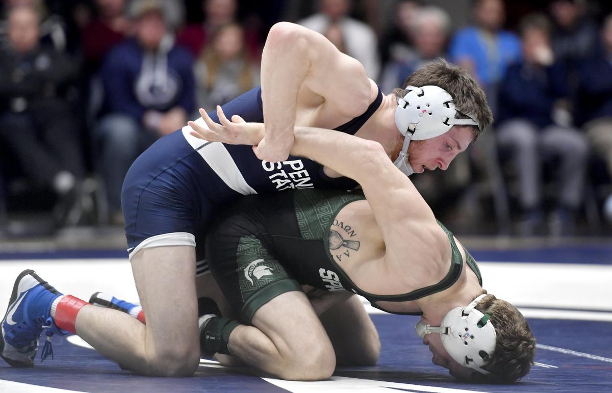 Penn State’s Nick Lee controls Michigan State’s Austin Eicher in the 141 lb bout during the match on Friday, Feb. 15, 2019. Lee won by major decision, 19-7.