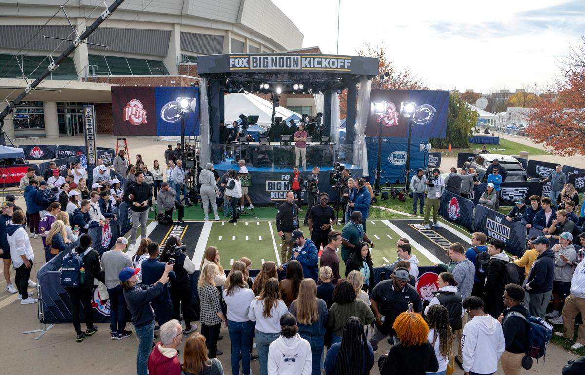 Penn State students gather to ask questions to the Fox Big Noon Kickoff hosts on the set on Friday, Oct. 28, 2022.