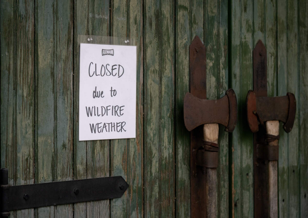 A sign on the door at Axemann Brewery that they will be closed due to the wildfire weather. Wildfire smoke from Canada caused unhealthy air levels in Centre County on Thursday, July 16, 2026.