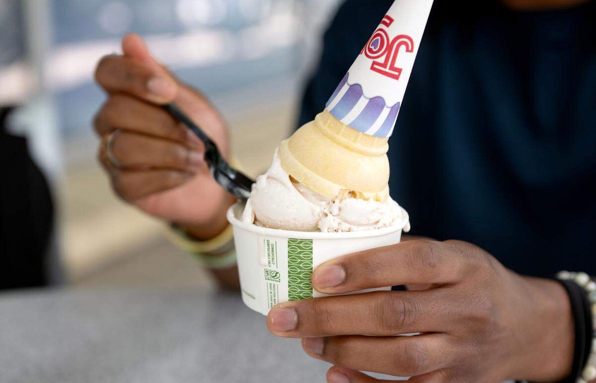 Centre Daily Times intern Jaden Perry eats ice cream at Penn State Berkey Creamery.