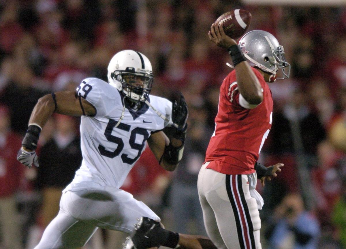 Penn State’s Aaron Maybin puts pressure on Ohio State’s Terrelle Pryor in 2008. (CDT/Christopher Weddle)