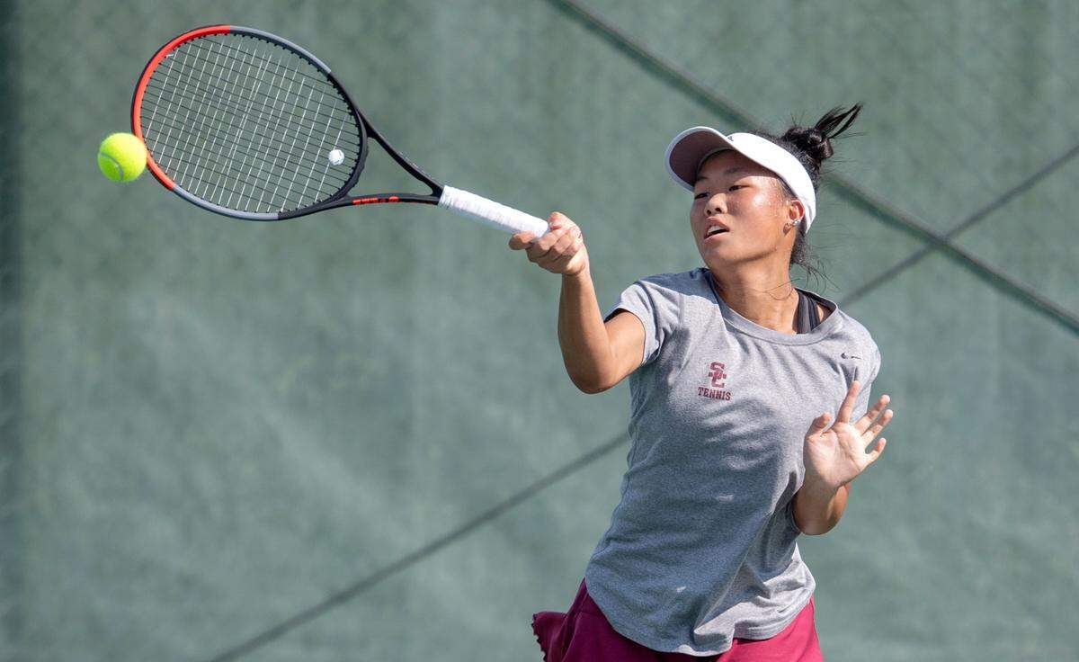 State College’s Quiana Guo returns the ball during the girls tennis match against Red Land on Thursday, Aug. 26, 2021.