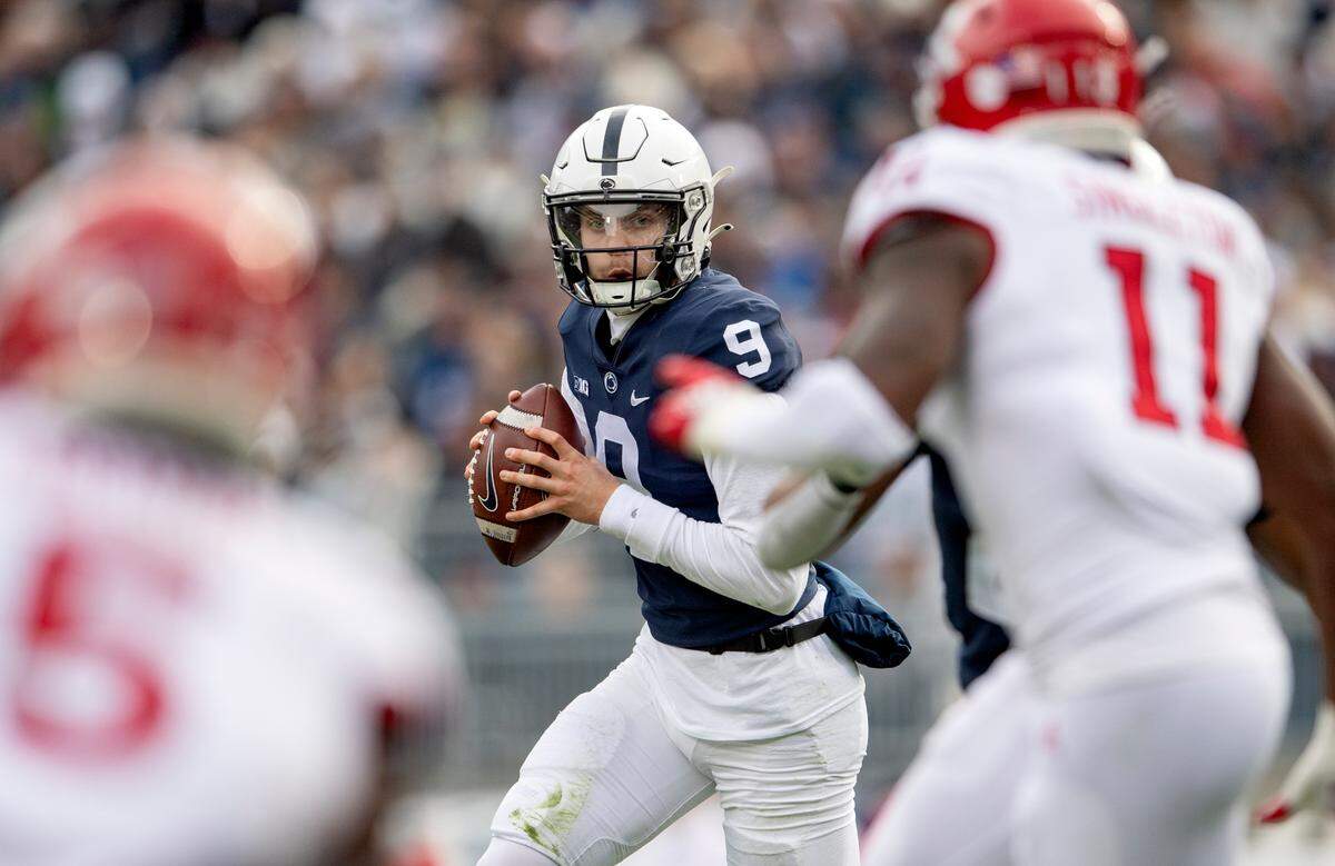 Penn State quarterback Christian Veilleux looks to make a pass to Jahan Dotson for a touchdown in the first half of the game against Rutgers on Saturday, Nov. 20, 2021.