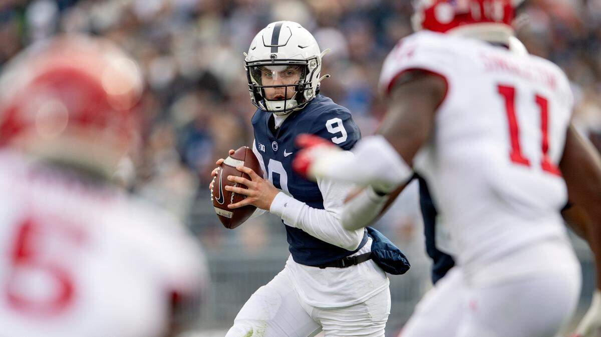Penn State quarterback Christian Veilleux looks to make a pass to Jahan Dotson for a touchdown in the first half of the game against Rutgers on Saturday, Nov. 20, 2021.