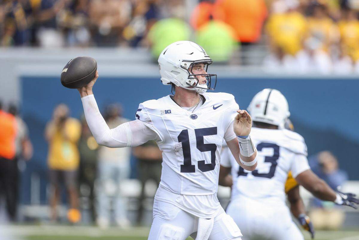 Aug 31, 2024; Morgantown, West Virginia, USA; Penn State Nittany Lions quarterback Drew Allar (15) throws a pass during the second quarter against the West Virginia Mountaineers at Mountaineer Field at Milan Puskar Stadium. Mandatory Credit: Ben Queen-USA TODAY Sports
