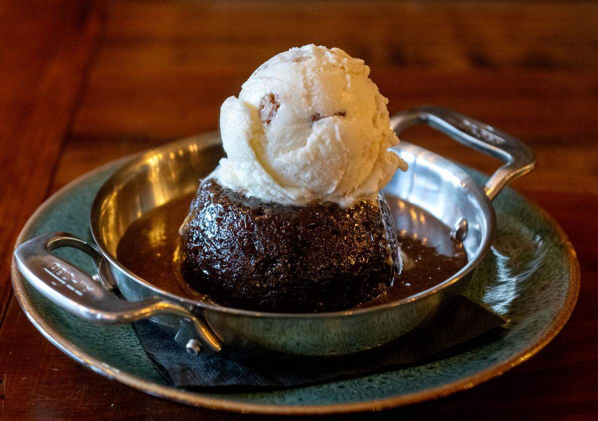 The sticky toffee pudding cake with butter pecan ice cream at Pass The Dutchie in Reedsville.
