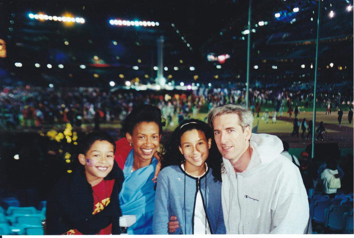 David Mazza, his wife Taylor and his children at the closing ceremony for the 2000 Summer Olympics in Sydney, Australia.  Out of the 17 Olympic Games he worked on, Mazza said Sydney was his favorite. 