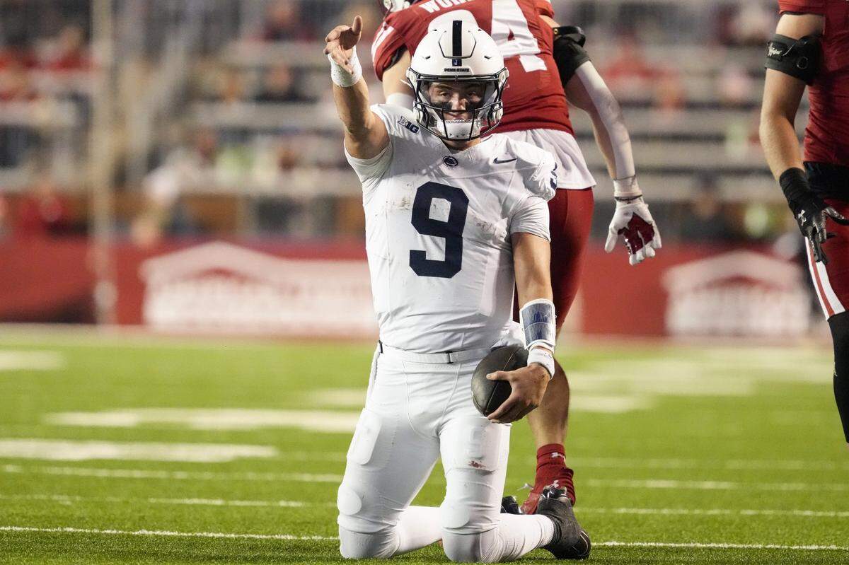 Oct 26, 2024; Madison, Wisconsin, USA;  Penn State Nittany Lions quarterback Beau Pribula (9) celebrates after earning a first down during the fourth quarter against the Wisconsin Badgers at Camp Randall Stadium. Mandatory Credit: Jeff Hanisch-Imagn Images