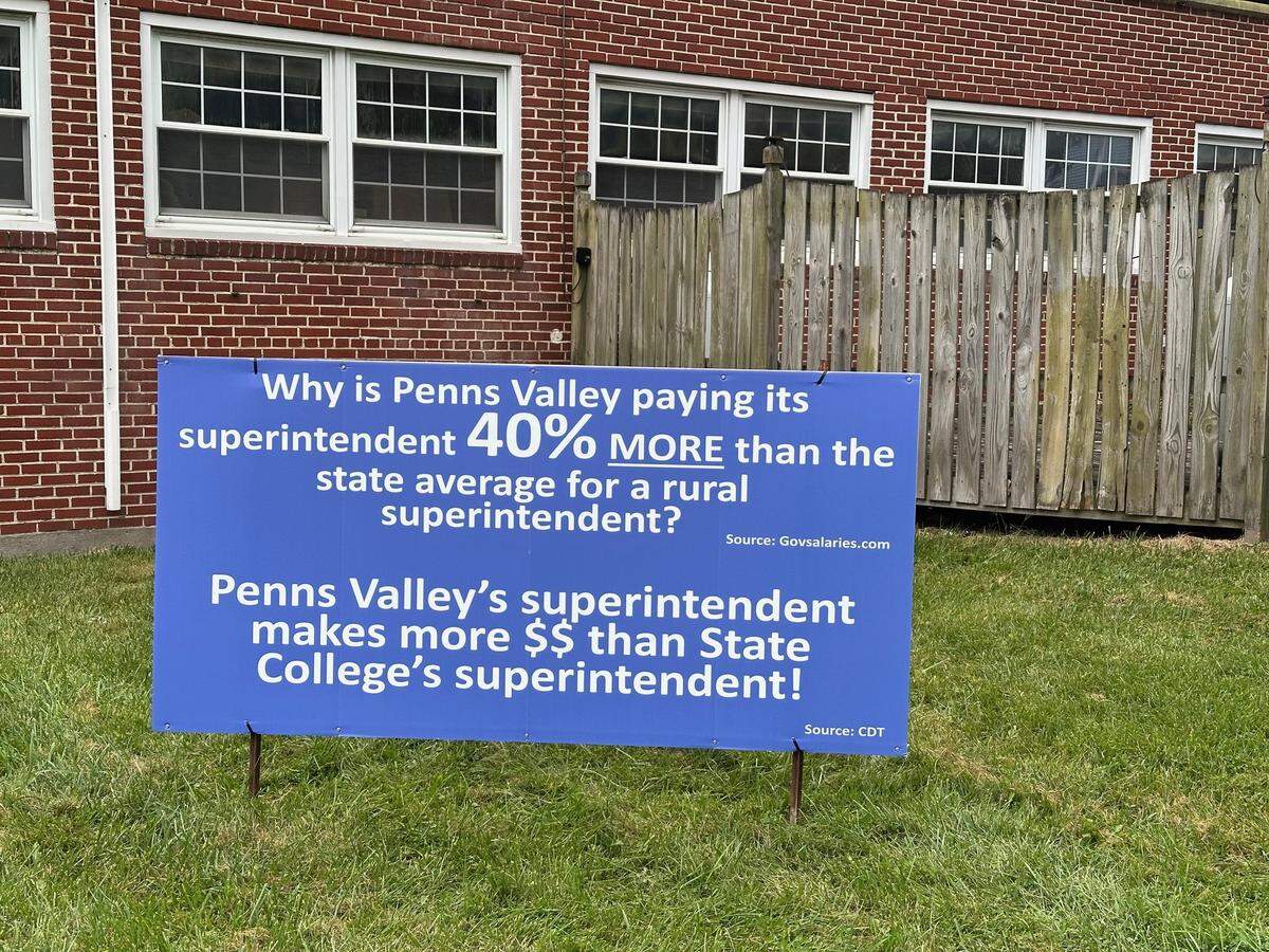 Two of the six signs relate to Superintendent Brian Griffith’s contract with the district.
