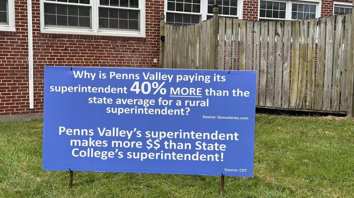 Two of the six signs relate to Superintendent Brian Griffith’s contract with the district.